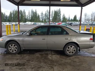 1998 Toyota Camry LE z VIN JT2BF28K1W0109514, wystawiony jako IAAI lot #41610102 z przebiegiem 161 266 mil mil oraz . Historia ofert i sprzedaży dostępna na DreamBid. Obrazek 14.