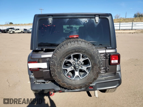 2023 Jeep Wrangler Rubicon with VIN 1C4HJXFN6PW509741, listed as a Copart auction lot 81324394 with 21,755 mi miles and Salvage title. Bid and sale history available at DreamBid. Image 6.