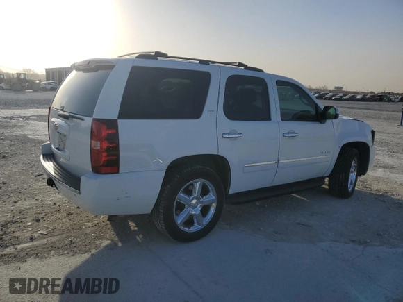 2013 Chevrolet Tahoe LTZ with VIN 1GNSCCE08DR102648, listed as a Copart auction lot 49677345 with 226,528 mi miles and Salvage title. Bid and sale history available at DreamBid. Image 3.