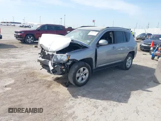 2016 Jeep Compass Latitude with VIN 1C4NJCEA7GD675742, listed as a IAAI auction lot 41877787 with 107,749 mi miles and . Bid and sale history available at DreamBid. Image 2.