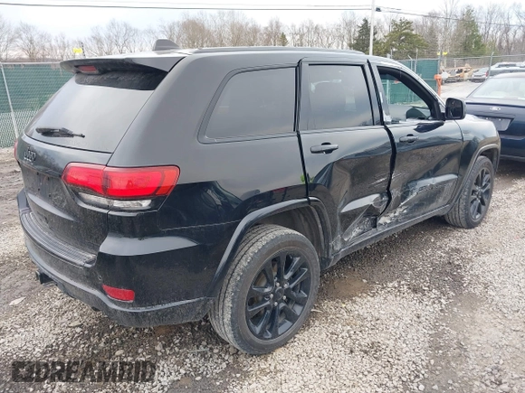 2017 Jeep Grand Cherokee Laredo with VIN 1C4RJFAG9HC882251, listed as a IAAI auction lot 41696710 with 129,627 mi miles and . Bid and sale history available at DreamBid. Image 4.