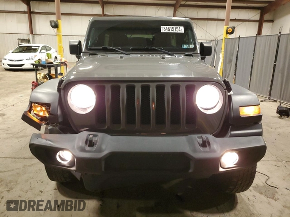 2020 Jeep Wrangler Unlimited Willys with VIN 1C4HJXDG3LW166868, listed as a Copart auction lot 84815154 with 66,640 mi miles and Salvage title. Bid and sale history available at DreamBid. Image 5.