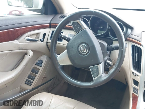 2008 Cadillac CTS RWD with VIN 1G6DV57V880128535, listed as a IAAI auction lot 39097540 with 153,140 mi miles and . Bid and sale history available at DreamBid. Image 16.