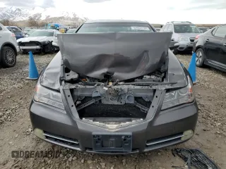 2009 Acura RL Tech Pkg with VIN JH4KB26609C002111, listed as a Copart auction lot 84668184 with 149,870 mi miles and Salvage Title. Bid and sale history available at carsss.com. Image 5.