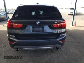 2017 BMW X1 sDrive28i with VIN WBXHU7C34HP924730, listed as a Copart auction lot 52245005 with 0 mi miles and Salvage Title. Bid and sale history available at carsss.com. Image 6.