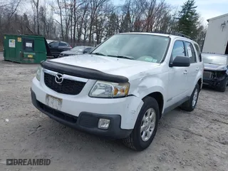 2008 Mazda Tribute Touring with VIN 4F2CZ961X8KM28763, listed as a IAAI auction lot 42048490 with 158,361 mi miles. Bid and sale history available at carsss.com. Image 2.