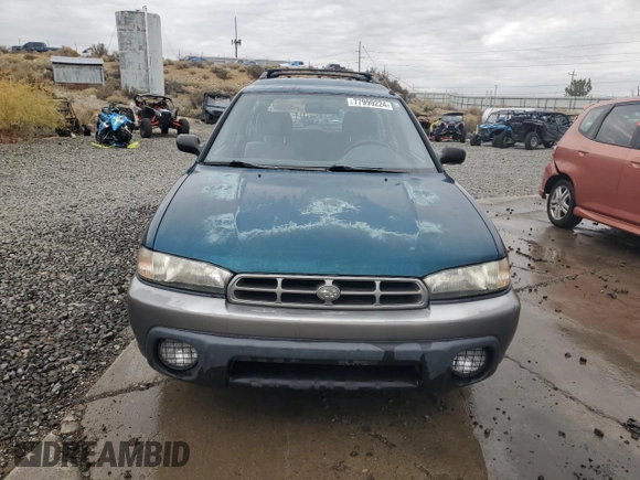 1996 Subaru Legacy Outback with VIN 4S3BG685XT7984194, listed as a Copart auction lot 77999224 with 130,804 mi miles and Salvage title. Bid and sale history available at DreamBid. Image 5.