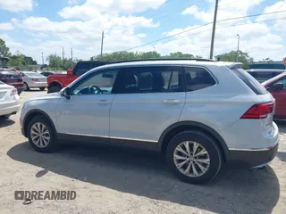 2018 Volkswagen Tiguan SEL with VIN 3VV3B7AX5JM053045, listed as a IAAI auction lot 41963017 with 77,495 mi miles and . Bid and sale history available at DreamBid. Image 14.