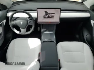 2022 Tesla Model Y Long Range with VIN 7SAYGDEE2NF403385, listed as a Copart auction lot 48594095 with 39,443 mi miles and Salvage Title. Bid and sale history available at DreamBid. Image 8.