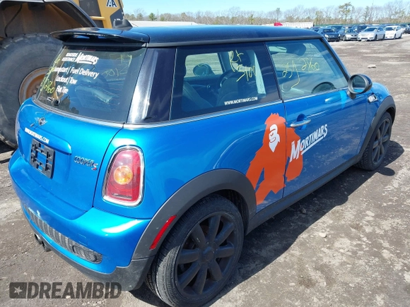 2007 MINI Hardtop S with VIN WMWMF73507TT83203, listed as a IAAI auction lot 41832035 with Not Provided miles and . Bid and sale history available at DreamBid. Image 4.