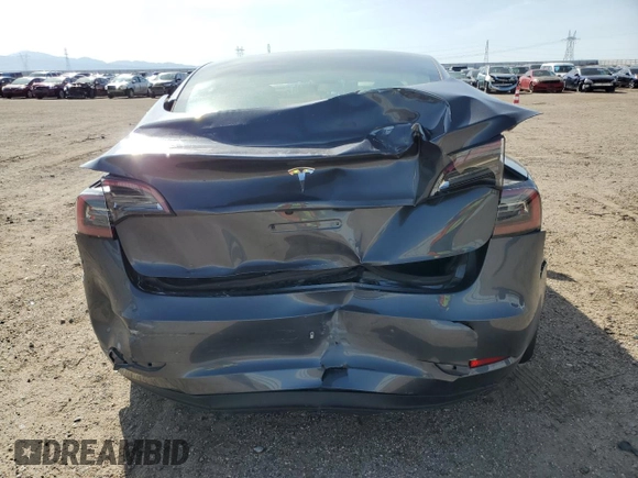 2023 Tesla Model 3 with VIN 5YJ3E1EA8PF648073, listed as a Copart auction lot 49284775 with 20,498 mi miles and Salvage Title. Bid and sale history available at DreamBid. Image 6.
