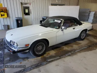 1989 Jaguar XJS z VIN SAJNV4846KC158092, wystawiony jako Copart lot #77359824 z przebiegiem 73 974 mil mil oraz Tytuł czysty. Historia ofert i sprzedaży dostępna na DreamBid. Obrazek 1.