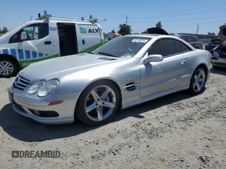2005 Mercedes-Benz SL 55 AMG z VIN WDBSK74FX5F089752, wystawiony jako Copart lot #66136845 z przebiegiem Nie podano mil oraz Szkoda całkowita • Salvage title. Historia ofert i sprzedaży dostępna na DreamBid. Obrazek 1.