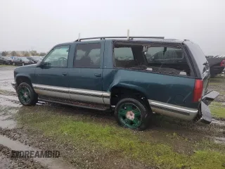 1997 Chevrolet Suburban with VIN 3GNFK16R6VG126891, listed as a Copart auction lot 87124124 with 279,836 mi miles and Salvage Title. Bid and sale history available at carsss.com. Image 2.