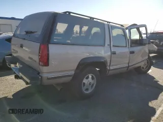1993 GMC Suburban z VIN 1GKGK26NXPJ711771, wystawiony jako Copart lot #85515174 z przebiegiem 63 064 mil mil oraz Szkoda całkowita • Salvage title. Historia ofert i sprzedaży dostępna na DreamBid. Obrazek 3.