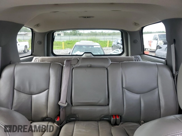 2005 Chevrolet Tahoe LT z VIN 1GNEC13T45J204205, wystawiony jako Copart lot #58231285 z przebiegiem 269 966 mil mil oraz Czysty tytuł • Clean title. Historia ofert i sprzedaży dostępna na DreamBid. Obrazek 10.
