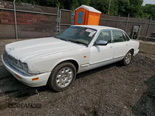 1995 Jaguar XJ with VIN SAJKX1742SC731597, listed as a Copart auction lot 58972395 with Not provided miles and Salvage title. Bid and sale history available at DreamBid. Image 1.