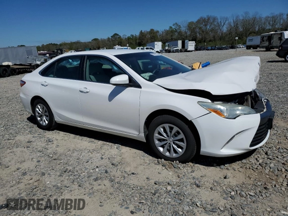 2015 Toyota Camry XLE with VIN 4T4BF1FKXFR483487, listed as a Copart auction lot 50311125 with 124,543 mi miles and Salvage Title. Bid and sale history available at carsss.com. Image 4.