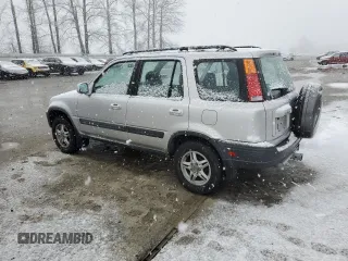 1999 Honda CR-V EX with VIN JHLRD1764XC084847, listed as a Copart auction lot 44084255 with 203,271 mi miles and Clean Title. Bid and sale history available at carsss.com. Image 2.
