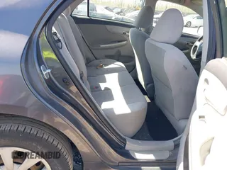 2011 Toyota Corolla L with VIN JTDBU4EE4B9144190, listed as a IAAI auction lot 42060728 with 115,299 mi miles. Bid and sale history available at carsss.com. Image 8.