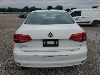 2015 Volkswagen Jetta S with VIN 3VW2K7AJXFM350192, listed as a Copart auction lot 63077355 with 70,089 mi miles and Salvage title. Bid and sale history available at DreamBid. Image 6.