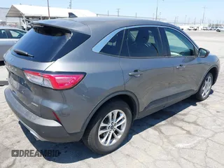 2021 Ford Escape SE with VIN 1FMCU9G65MUA38639, listed as a IAAI auction lot 42621442 with 105,737 mi miles and . Bid and sale history available at DreamBid. Image 4.