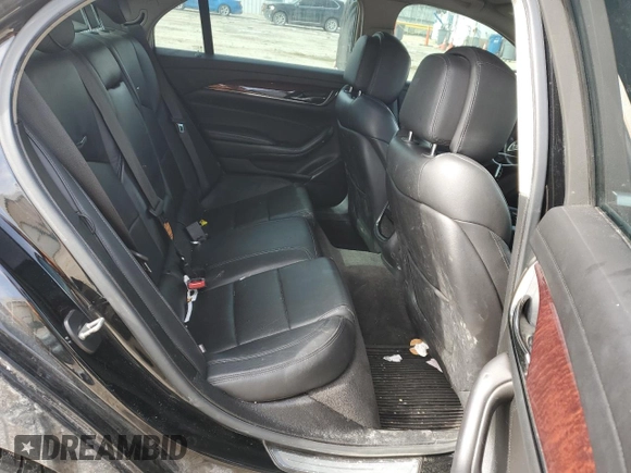 2014 Cadillac CTS AWD z VIN 1G6AW5SX7E0172031, wystawiony jako Copart lot #45740395 z przebiegiem 149 716 mil mil oraz Szkoda całkowita • Salvage title. Historia ofert i sprzedaży dostępna na DreamBid. Obrazek 10.