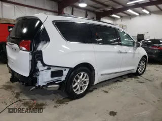 2020 Chrysler Pacifica Touring L with VIN 2C4RC1BGXLR128514, listed as a Copart auction lot 57333635 with 71,109 mi miles and Salvage title. Bid and sale history available at DreamBid. Image 3.