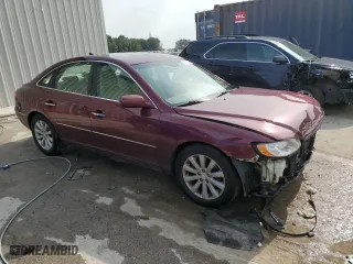 2009 Hyundai Azera GLS with VIN KMHFC46D19A358682, listed as a Copart auction lot 65164534 with 168,592 mi miles and Salvage Title. Bid and sale history available at carsss.com. Image 4.