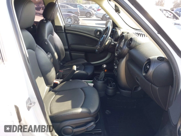 2014 MINI Countryman S с VIN WMWZC5C5XEWM18313, выставлен на аукционе IAAI как лот 42106902 с пробегом 91 662 миль миль и . История ставок и продаж доступна на DreamBid. Изображение 5.