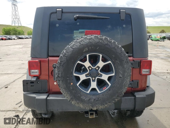 2010 Jeep Wrangler Unlimited Rubicon with VIN 1J4BA6H14AL115460, listed as a Copart auction lot 58349925 with Not provided miles and Salvage title. Bid and sale history available at DreamBid. Image 6.