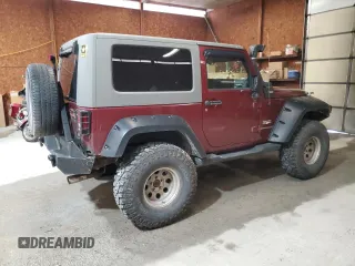 2007 Jeep Wrangler Sahara z VIN 1J4FA54127L132543, wystawiony jako Copart lot #55891995 z przebiegiem 74 616 mil mil oraz Szkoda całkowita • Salvage title. Historia ofert i sprzedaży dostępna na DreamBid. Obrazek 3.