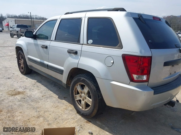2005 Jeep Grand Cherokee Laredo with VIN 1J4GS48K45C633414, listed as a IAAI auction lot 41797842 with 311,852 mi miles. Bid and sale history available at carsss.com. Image 3.