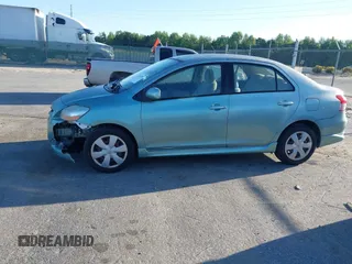 2007 Toyota Yaris with VIN JTDBT923371029654, listed as a IAAI auction lot 42142361 with 296,107 mi miles. Bid and sale history available at carsss.com. Image 13.
