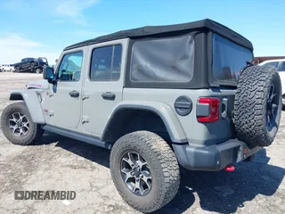 2018 Jeep Wrangler Unlimited Rubicon with VIN 1C4HJXFG6JW267087, listed as a IAAI auction lot 42235058 with 93,962 mi miles and . Bid and sale history available at DreamBid. Image 3.