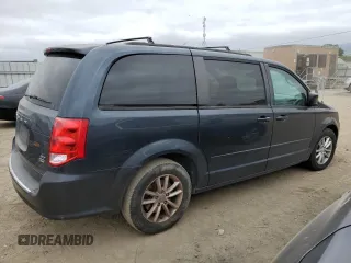 2014 Dodge Grand Caravan SXT with VIN 2C4RDGCG5ER267354, listed as a Copart auction lot 54548955 with 145,971 mi miles and Clean Title. Bid and sale history available at DreamBid. Image 3.