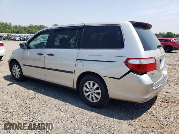 2007 Honda Odyssey LX with VIN 5FNRL38287B054504, listed as a Copart auction lot 59141665 with 128,617 mi miles and Salvage title. Bid and sale history available at DreamBid. Image 2.