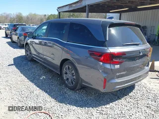 2025 Honda Odyssey Touring z VIN 5FNRL6H84SB028769, wystawiony jako IAAI lot #41856080 z przebiegiem Nie podano mil oraz . Historia ofert i sprzedaży dostępna na DreamBid. Obrazek 3.