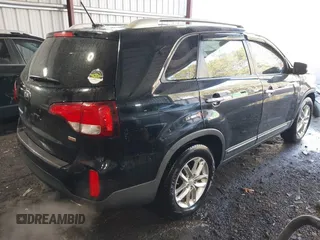 2014 Kia Sorento LX with VIN 5XYKT4A73EG471273, listed as a IAAI auction lot 41838577 with 102,760 mi miles and . Bid and sale history available at carsss.com. Image 4.