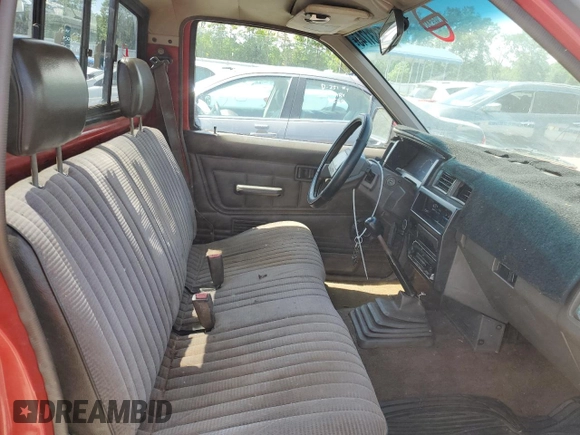 1992 Nissan Frontier z VIN 1N6SD11S0NC356308, wystawiony jako Copart lot #55831745 z przebiegiem 327 113 mil mil oraz Szkoda całkowita • Salvage title. Historia ofert i sprzedaży dostępna na DreamBid. Obrazek 10.