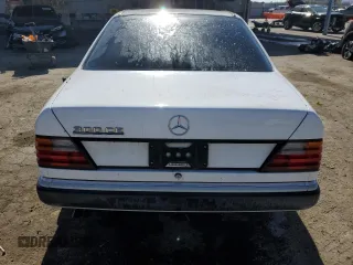 1990 Mercedes-Benz 300 with VIN WDBEA51D0LB167029, listed as a Copart auction lot 68581534 with 184,595 mi miles and Salvage Title. Bid and sale history available at carsss.com. Image 6.