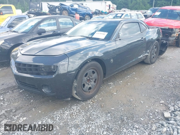 2013 Chevrolet Camaro LS z VIN 2G1FA1E39D9206888, wystawiony jako IAAI lot #42170703 z przebiegiem 169 661 mil mil oraz . Historia ofert i sprzedaży dostępna na DreamBid. Obrazek 22.