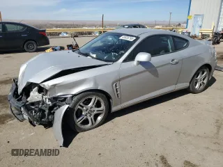 2006 Hyundai Tiburon GT z VIN KMHHN65F76U190851, wystawiony jako Copart lot #45935795 z przebiegiem 102 335 mil mil oraz Szkody całkowita. Historia ofert i sprzedaży dostępna na DreamBid. Obrazek 1.