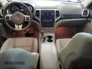 2011 Jeep Grand Cherokee Laredo with VIN 1J4RR4GG3BC669561, listed as a Copart auction lot 63627395 with 99,211 mi miles and Salvage title. Bid and sale history available at DreamBid. Image 8.