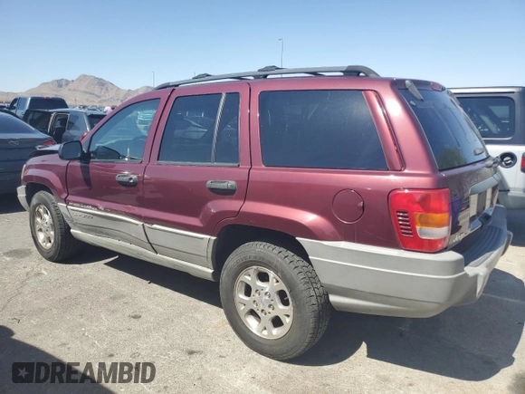 2000 Jeep Grand Cherokee Laredo with VIN 1J4G248S1YC407769, listed as a Copart auction lot 61653545 with 188,882 mi miles and Salvage title. Bid and sale history available at DreamBid. Image 2.