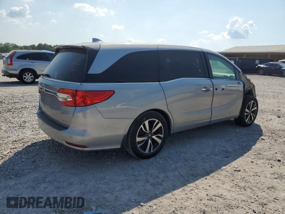 2018 Honda Odyssey Elite with VIN 5FNRL6H94JB010442, listed as a Copart auction lot 62077815 with 118,058 mi miles and Salvage title. Bid and sale history available at DreamBid. Image 3.