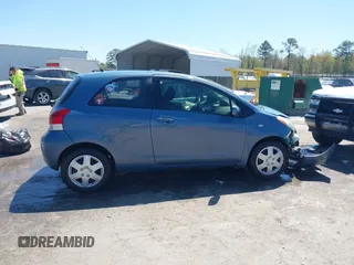 2010 Toyota Yaris with VIN JTDJT4K36A5285298, listed as a IAAI auction lot 42003609 with 158,418 mi miles. Bid and sale history available at carsss.com. Image 13.
