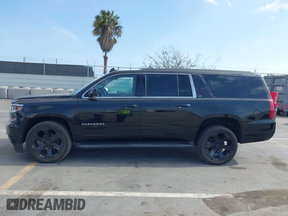 2020 Chevrolet Suburban LT with VIN 1GNSCHKC2LR229759, listed as a IAAI auction lot 42128257 with 46,138 mi miles and . Bid and sale history available at DreamBid. Image 14.