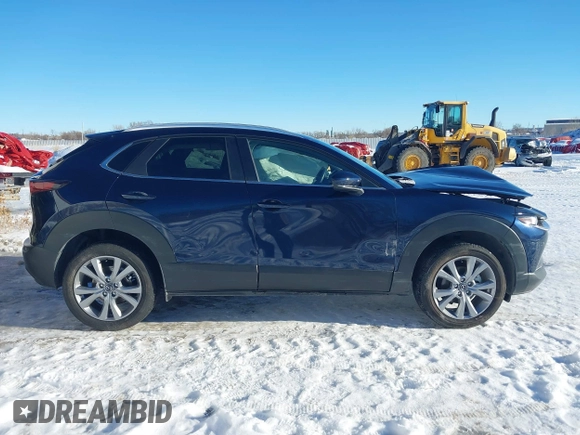 2022 Mazda CX-30 S Select with VIN 3MVDMBBL9NM448264, listed as a IAAI auction lot 41294686 with 9,324 mi miles and . Bid and sale history available at DreamBid. Image 13.