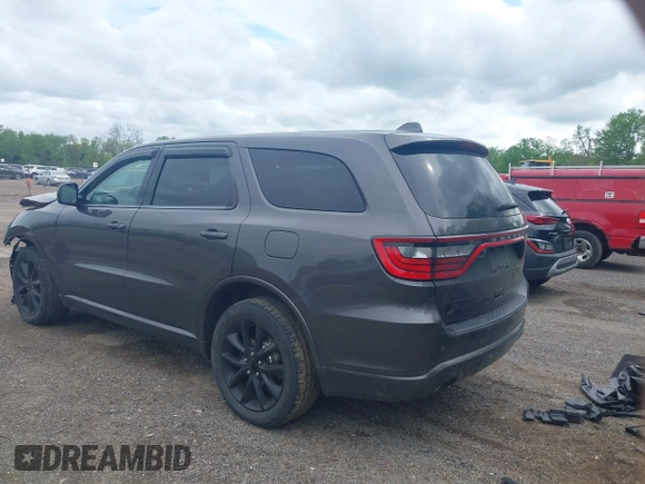 2018 Dodge Durango SXT with VIN 1C4RDJAG7JC116289, listed as a IAAI auction lot 42256051 with 119,579 mi miles and . Bid and sale history available at DreamBid. Image 3.